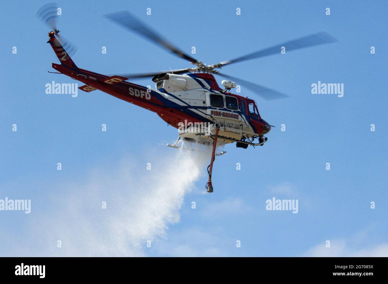 San Diego Fire Rescue Copter 2 completes a water drop. Stock Photo