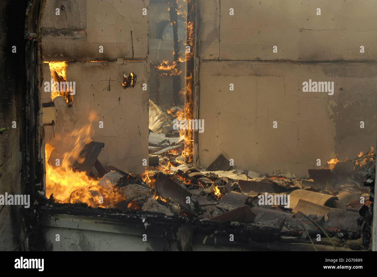 Interior of home, reduced to ashes, Witch Creek Fire, near San Diego, California. Stock Photo