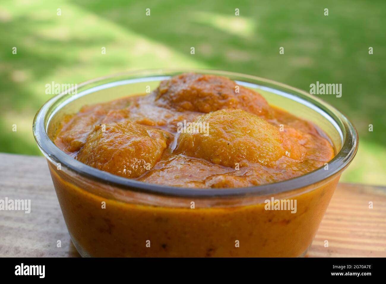 popular punjabi North Indian side dish Dum aloo with gravy. Indian food recipe baby potato