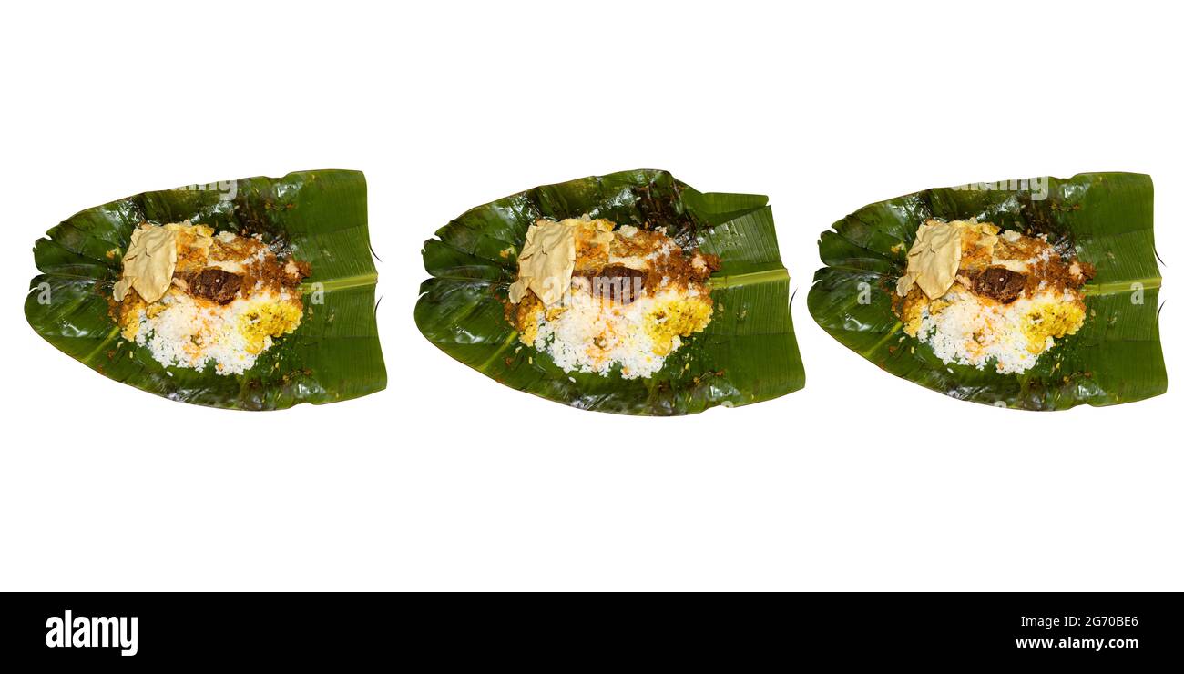Kerala Style Rice And Curry Served In Banana Leaves. Selective Focus Stock Photo