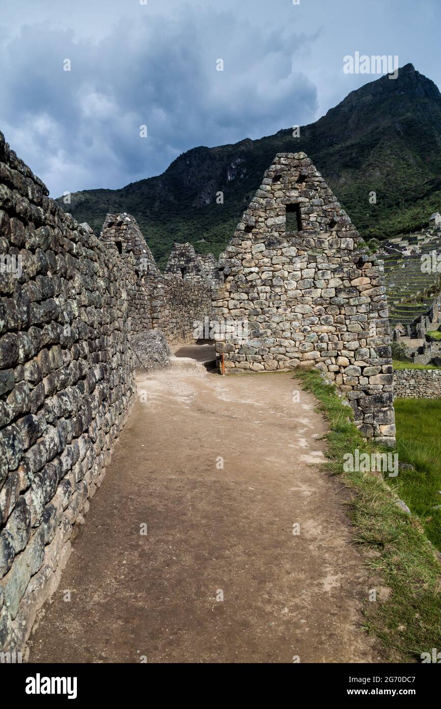 Preserved houses at Machu Picchu ruins, Peru Stock Photo - Alamy
