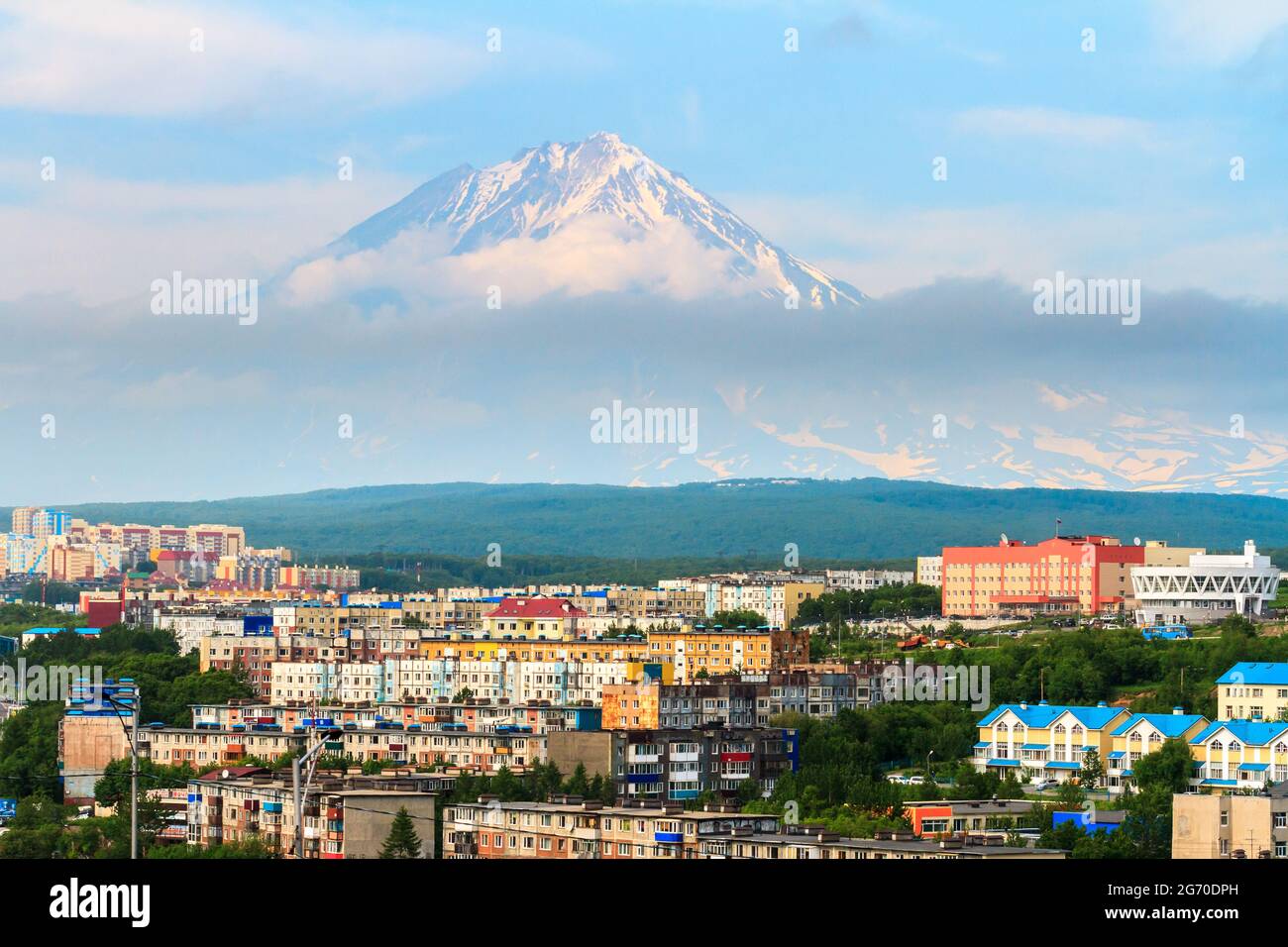View of the city Petropavlovsk-Kamchatsky on background of Koryaksky Volcano, Kamchatka Peninsula. Stock Photo