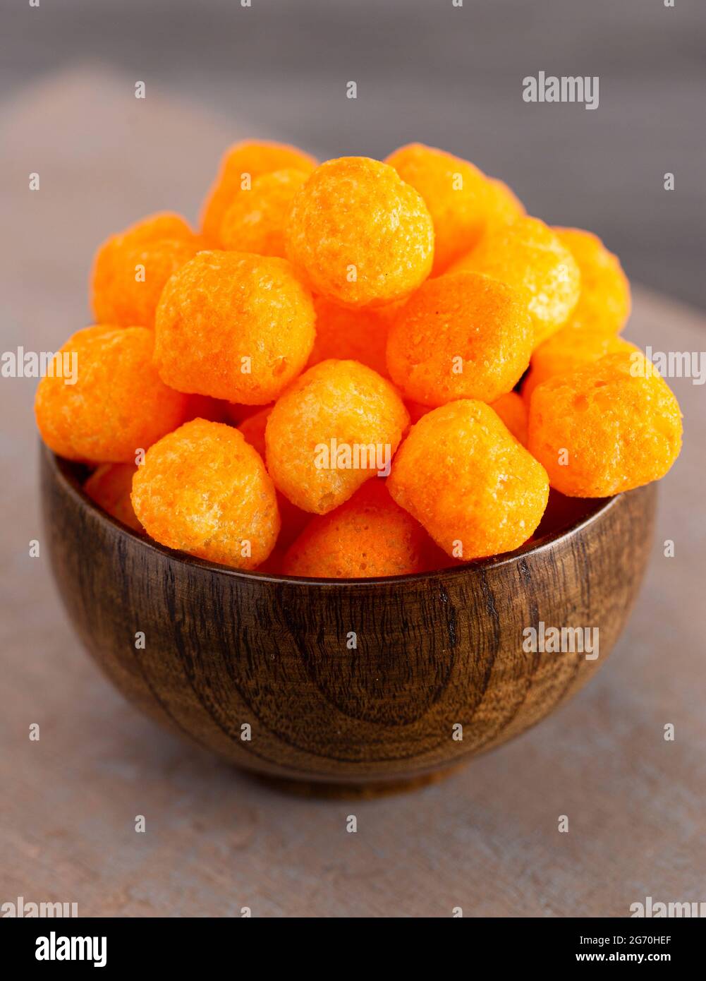 Cheese Puff Balls in Wooden Bowl on Light Background Stock Image - Image of  fried, cereal: 133510255