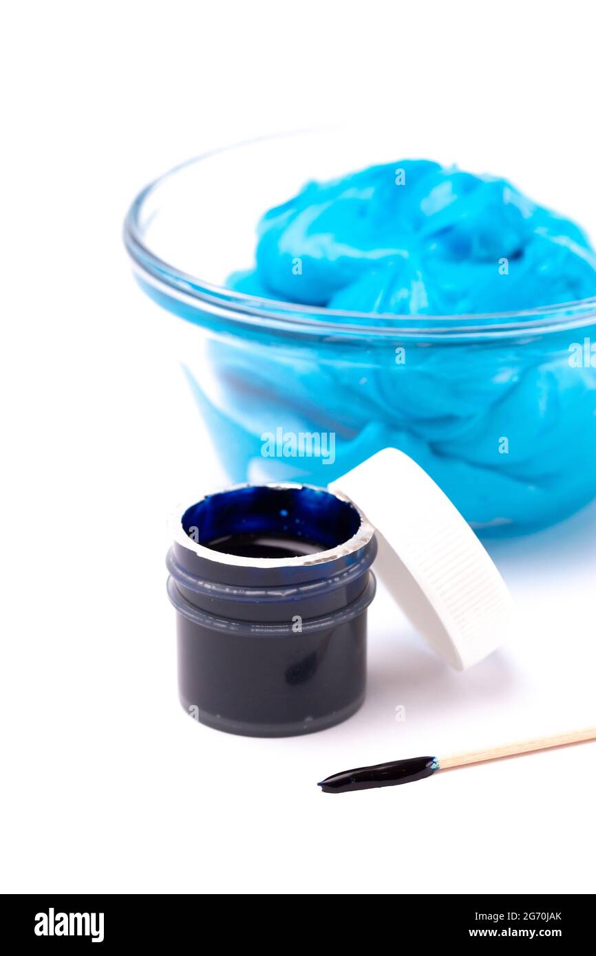 An Opened Pot of Blue Gel Food Coloring for Baking Isolated on a White