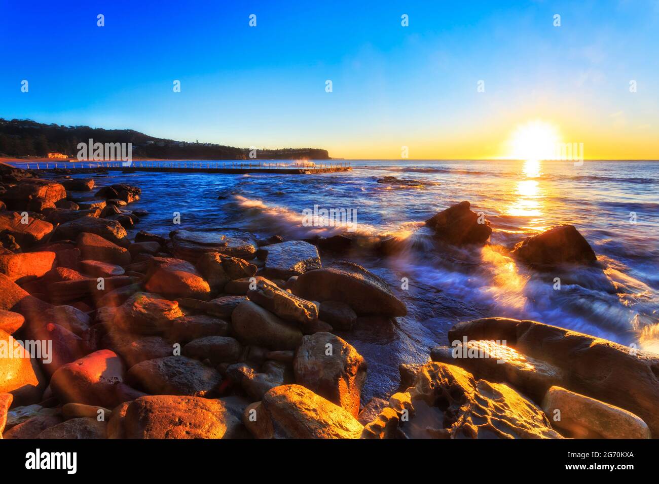 Scenic colourful sunrise at Newport beach of Sydney Northern beaches in