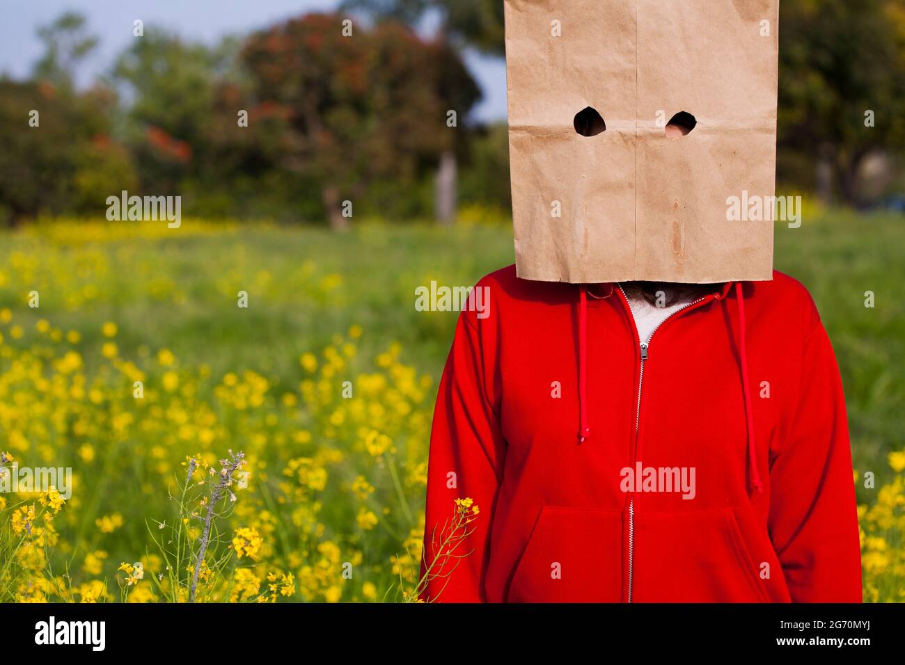 Bag head standing in a field Stock Photo Alamy