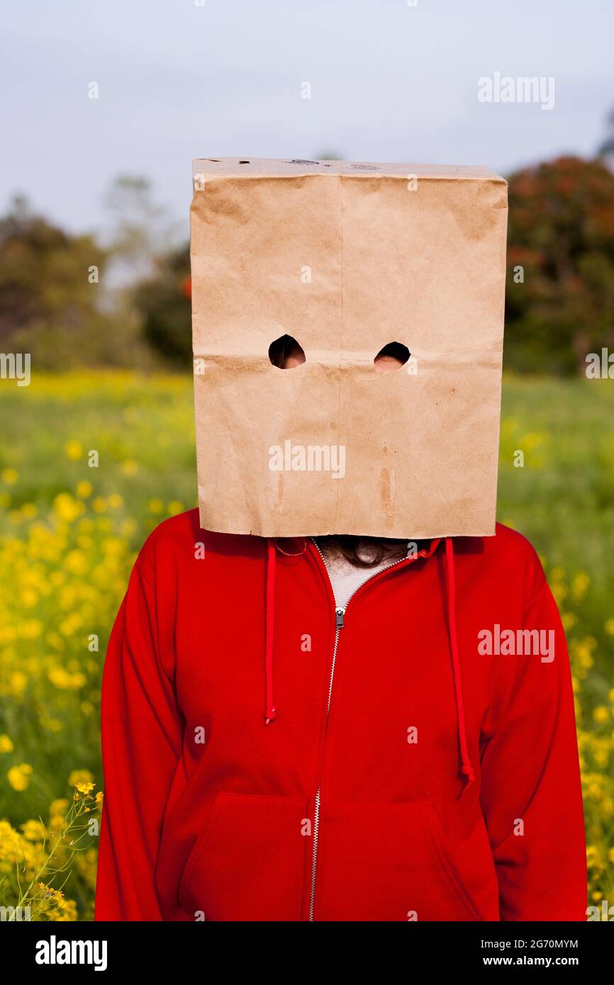 Bag head standing in a field Stock Photo Alamy