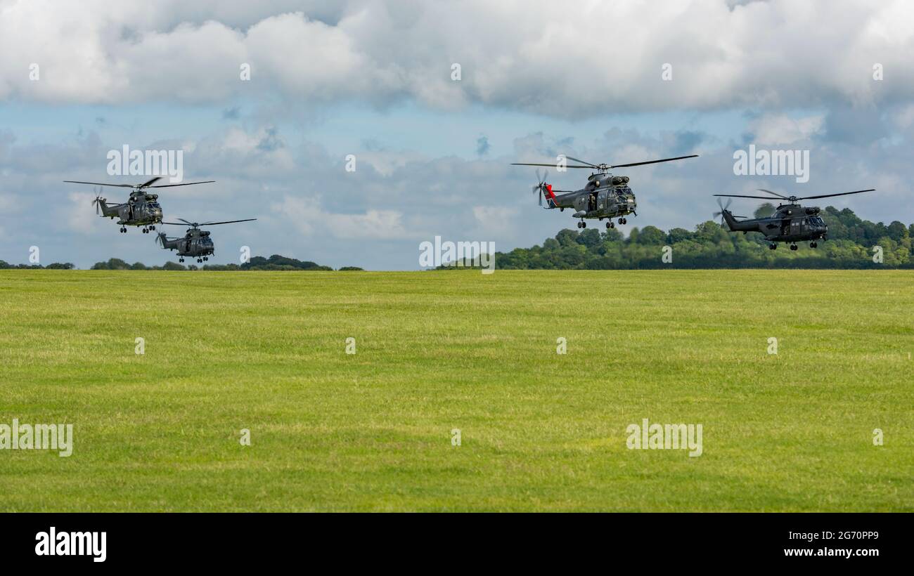 RAF Puma helicopters taking off from AAC Middle Wallop as part of the Puma 50th Anniversary flying tour of the UK on the 7th July 2021. Stock Photo
