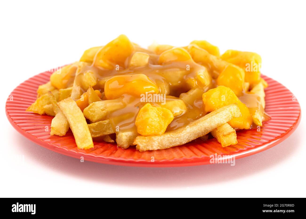 Poutine with Orange Cheddar Cheese with Brown Gravy on French Fries