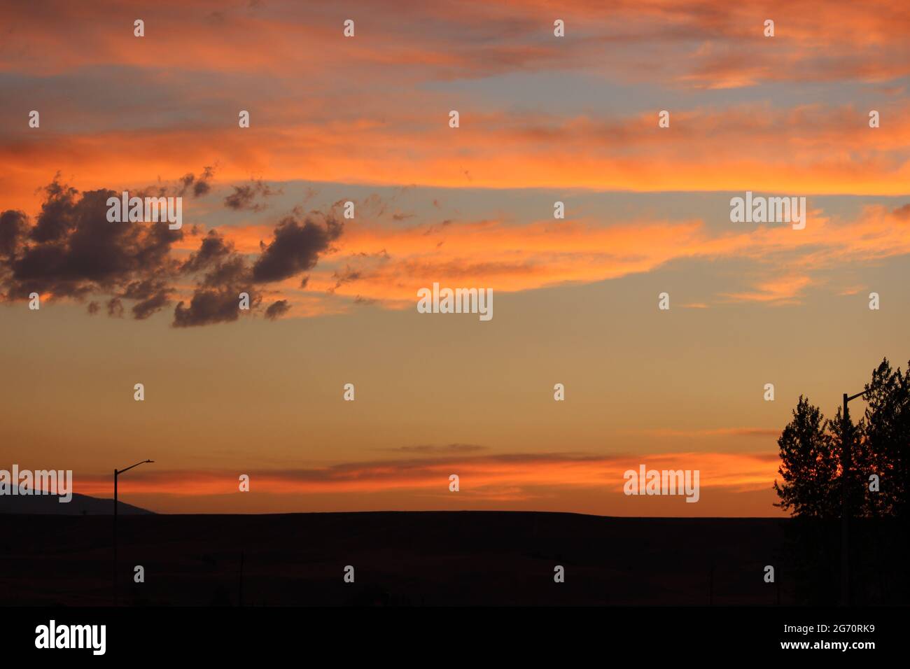 Sunset over the mountains Stock Photo