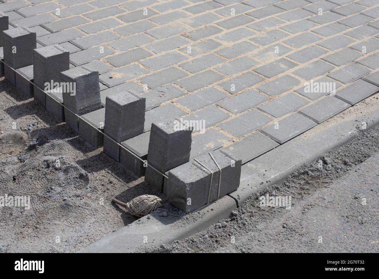 Paving stones in the process Stock Photo Alamy