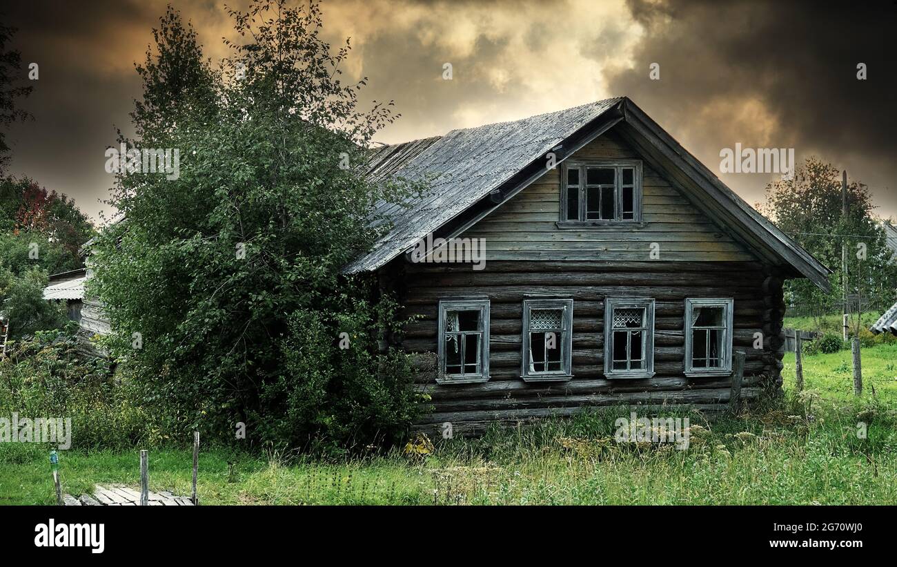 Old Russian wooden houses in the village and provincial town of Arkhangelsk near-polar regions Stock Photo