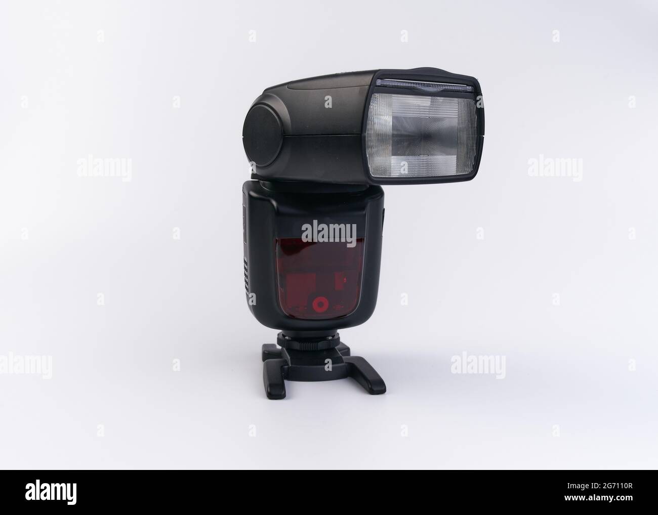 Handheld flash for photographic camera isolated on a white background