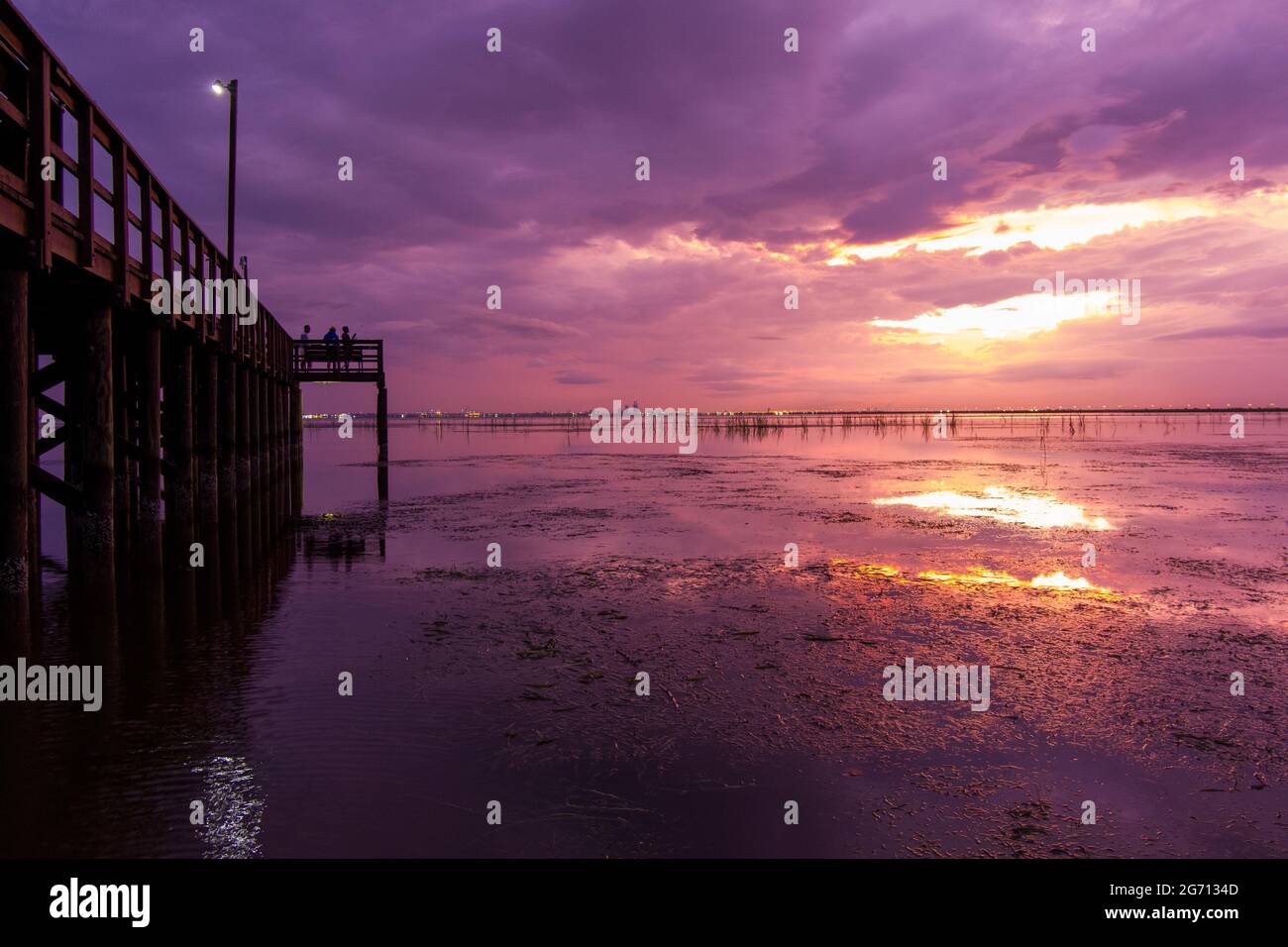 Mobile Bay pier at sunset in July of 2021 Stock Photo - Alamy