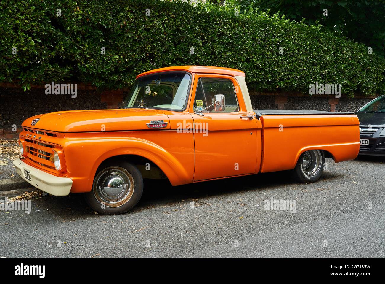 Ramsgate, United Kingdom - June 29, 2021: A mid sixties orange Ford F100 Pickup Truck Stock Photo