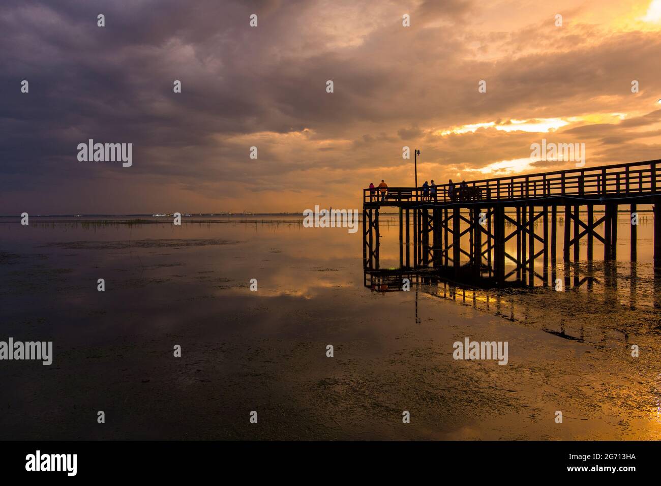 Mobile Bay pier at sunset in July of 2021 Stock Photo - Alamy