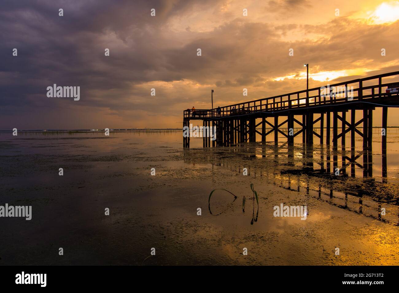 Mobile Bay pier at sunset in July of 2021 Stock Photo - Alamy