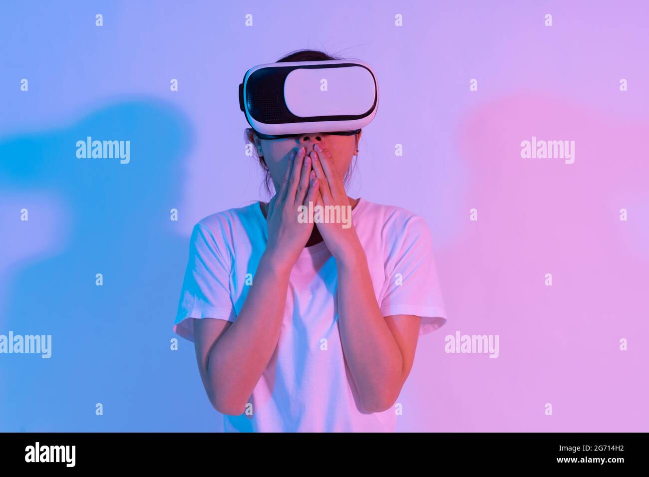portrait of young asian girl wearing virtual reality glasses Stock Photo
