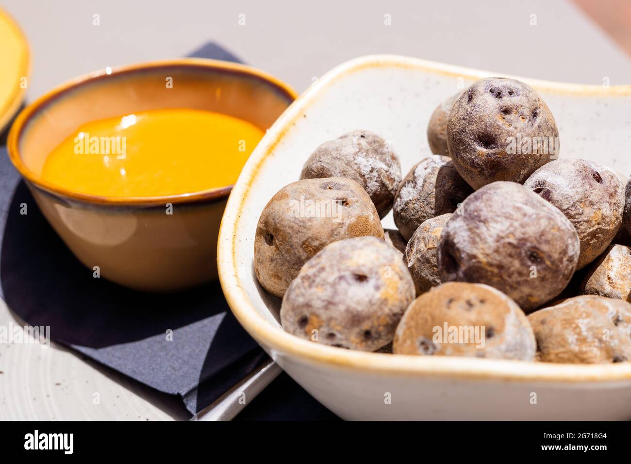 Closeup shot of a bowl with wrinkled potatoes a typical food in Canary Island in Spain Stock Photo