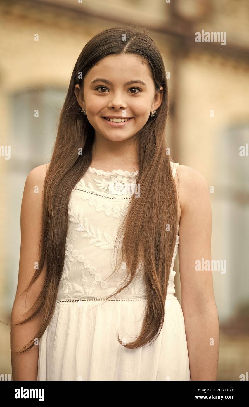 Love the shine. Beauty look of child girl. Happy child smile outdoors.  Little child with long hair in casual wear. Trendy style. Fashion trend.  Child Stock Photo - Alamy