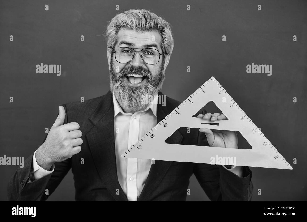 Mathematics favorite subject. Man teacher use math rule tool. Bearded ...