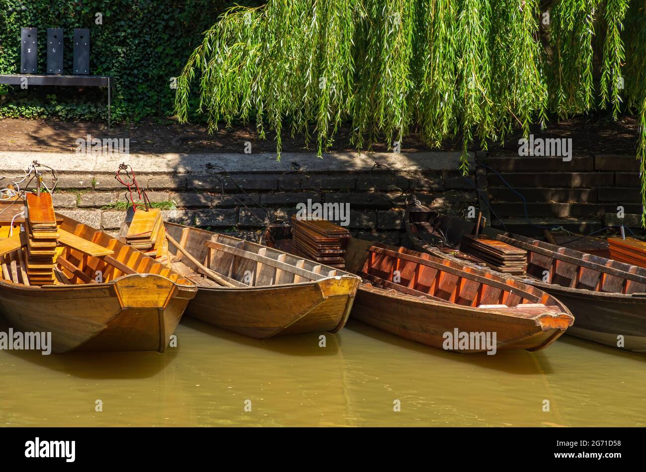 Punting boats by the side of the Neckar Waterfront in Tübingen, Baden-Württemberg, Germany. Stock Photo