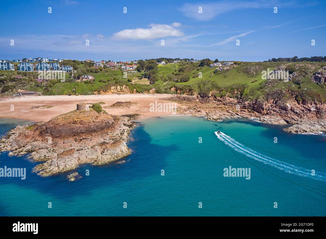 Aerial Drone image of Portelet Bay, Jersey, Channel Islands with blue