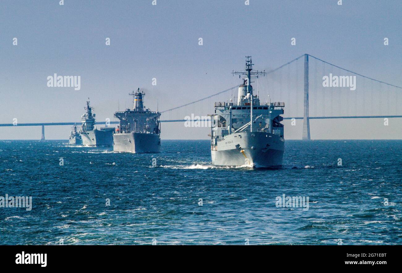 RFA Fort Rosalie leading a group of NATO ships USNS Patuxent, HMS Ark Royal and HMS Manchester Stock Photo