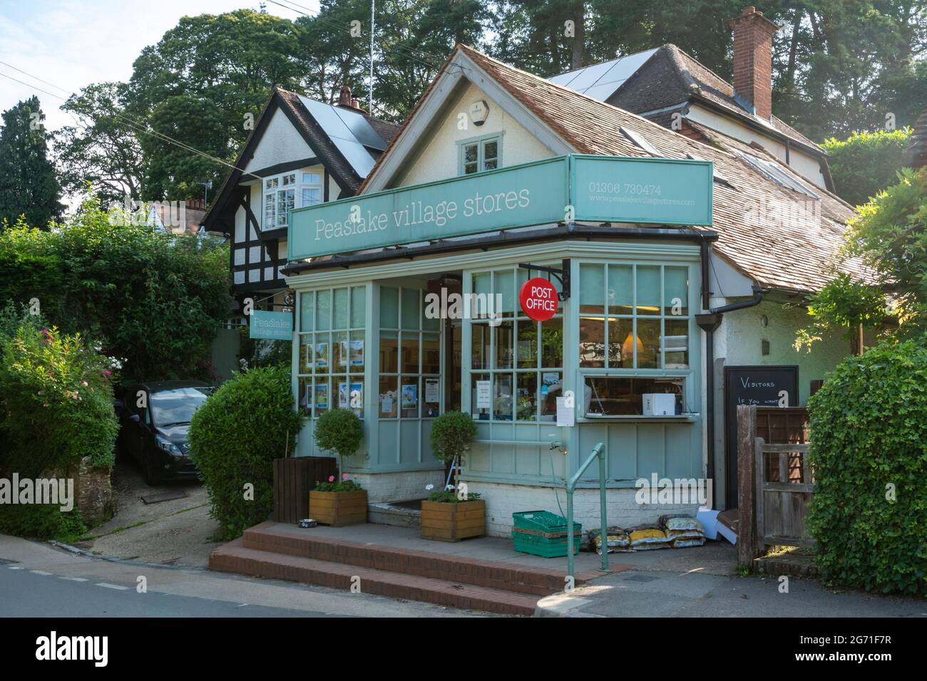 Peaslake village stores, a shop in the pretty village of Peaslake in the Surrey Hills AONB, England, UK Stock Photo