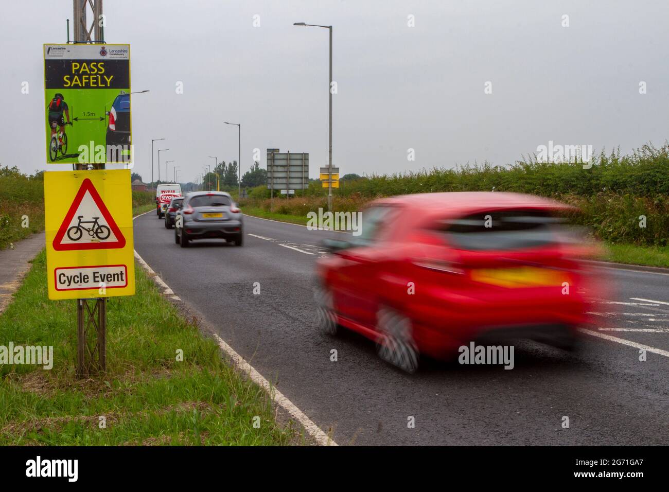 Pass Safely Sign Cycle Event, Police community road safety partnership   Roadside traffic signs in Southport, UK Stock Photo