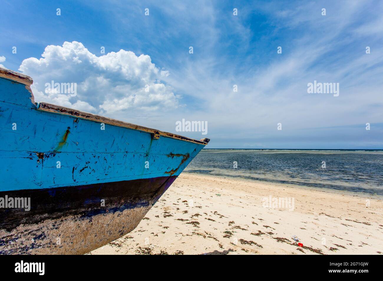 Blue and white fishing boat on the beach of Gili Air, Indonesia ...