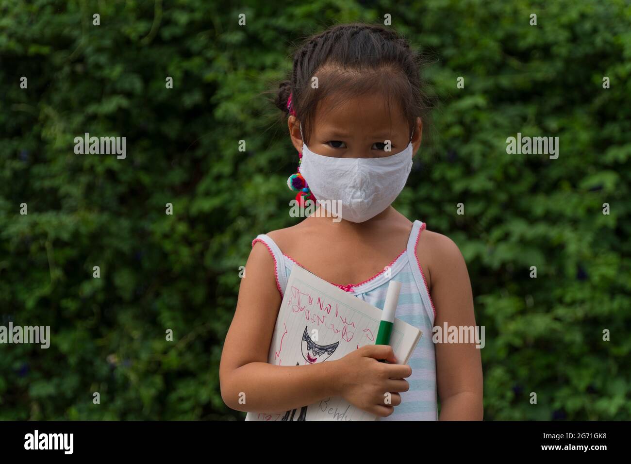 Teenage Girl In Reusable Protective Face Mask Drinking Water Outdoors In  Campus Or Schoolyard New Normal And Back To School Concept After Covid19  Quarantine High-Res Stock Photo - Getty Images