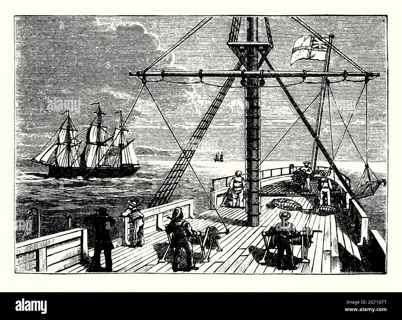 An old engraving of Harvey’s Torpedo being used. It is from a Victorian book of the 1890s on discoveries and inventions during the 1800s. The Harvey Torpedo was invented Britain in the late 1860s by Frederick Harvey and John Harvey. The torpedo involved an explosive charge attached to a line with buoys and winches. Here the ship is moving forwards. The mine’s towing lines are controlled on deck. The torpedo is pulled to the surface to be detonated at its target, the ship (left) – an improvement on existing designs where a mine was suspended on a spar over the bow of a ship. Stock Photo