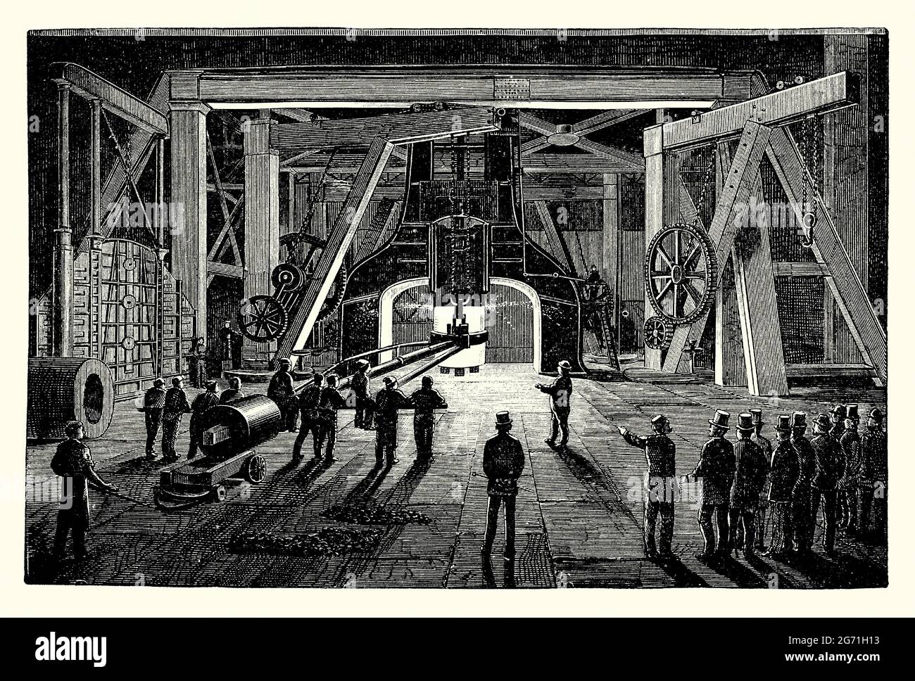 An old engraving of the Great Steam Hammer at the Woolwich Gun Factory, London, England, UK c. 1875. It is from a Victorian book of the 1890s on discoveries and inventions during the 1800s. The 35-ton hammer, built by Nasmyth and Co, was used to forge guns for the British Navy. A steam hammer, also called a drop hammer, is an industrial power hammer driven by steam that is used for tasks such as shaping forgings and driving piles. Stock Photo