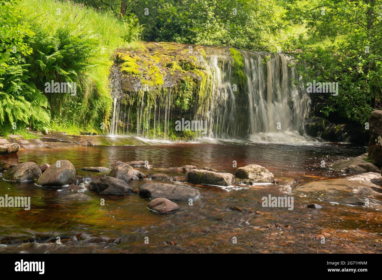 Natural beautiful waterfalls taken with long exposure to make the water silky smooth in the Brecon Beacons national park. Stock Photo