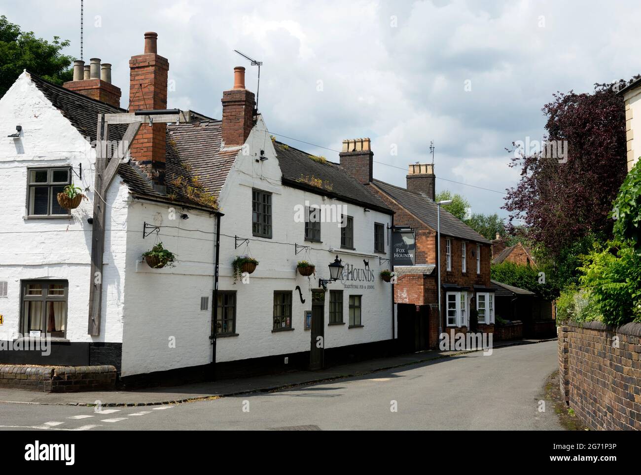 The Fox and Hounds pub and Main Street, Shenstone, Staffordshire