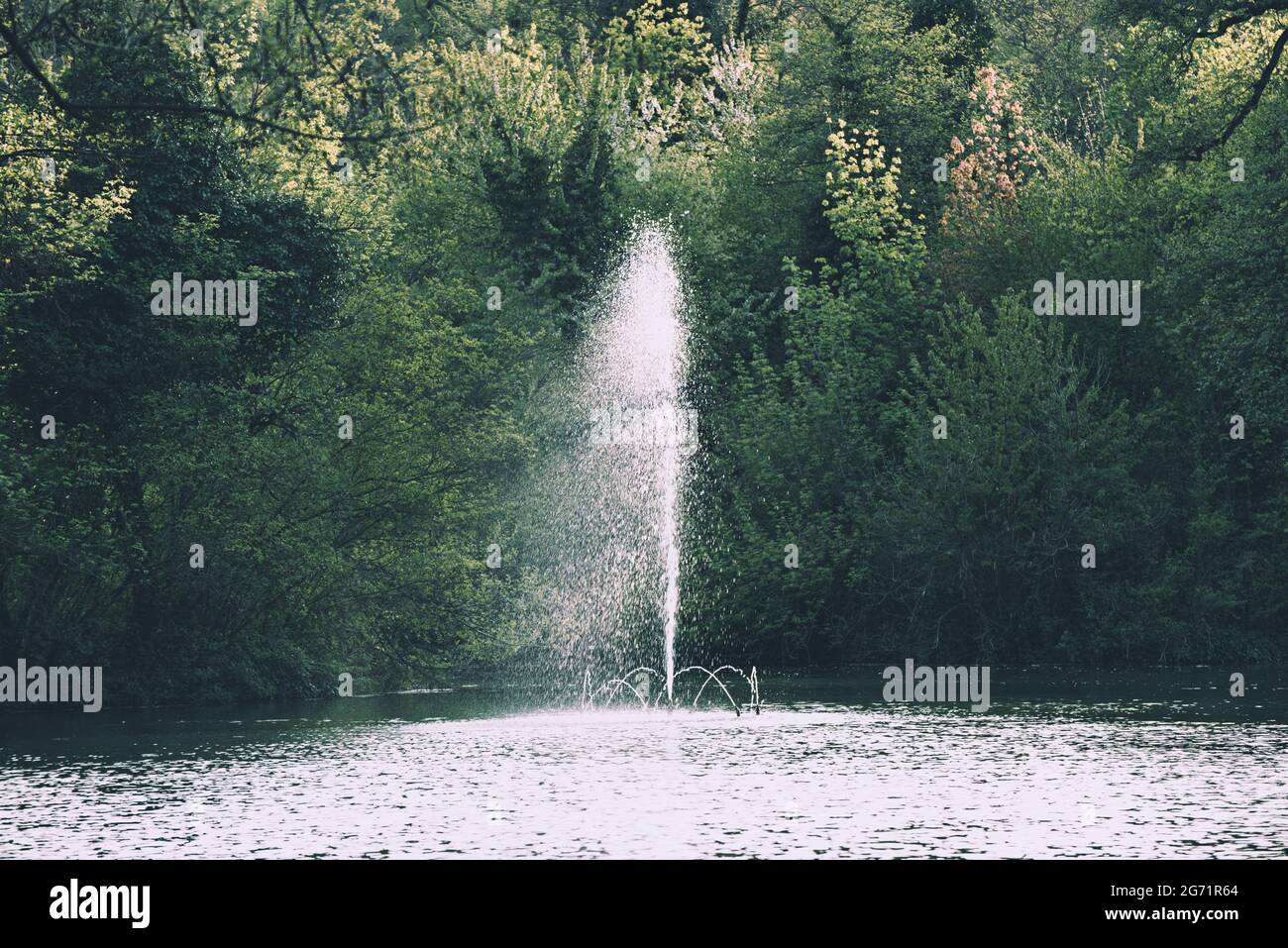 A fountain in a public park Stock Photo - Alamy