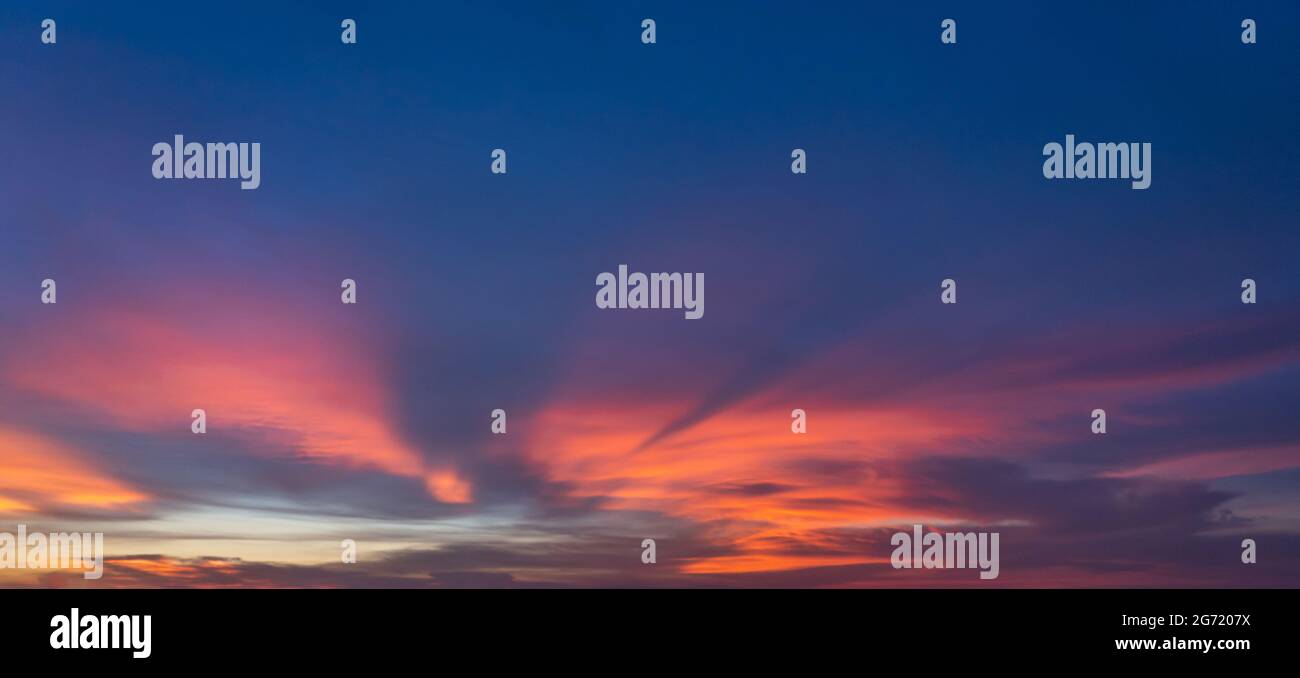 Panorama photo of dramatic sky at beautiful sunset Stock Photo - Alamy