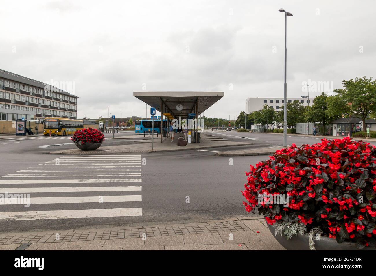 Randers, Denmark - 10-July-2021: Randers bus terminal, people are waiting for the bus. Stock Photo