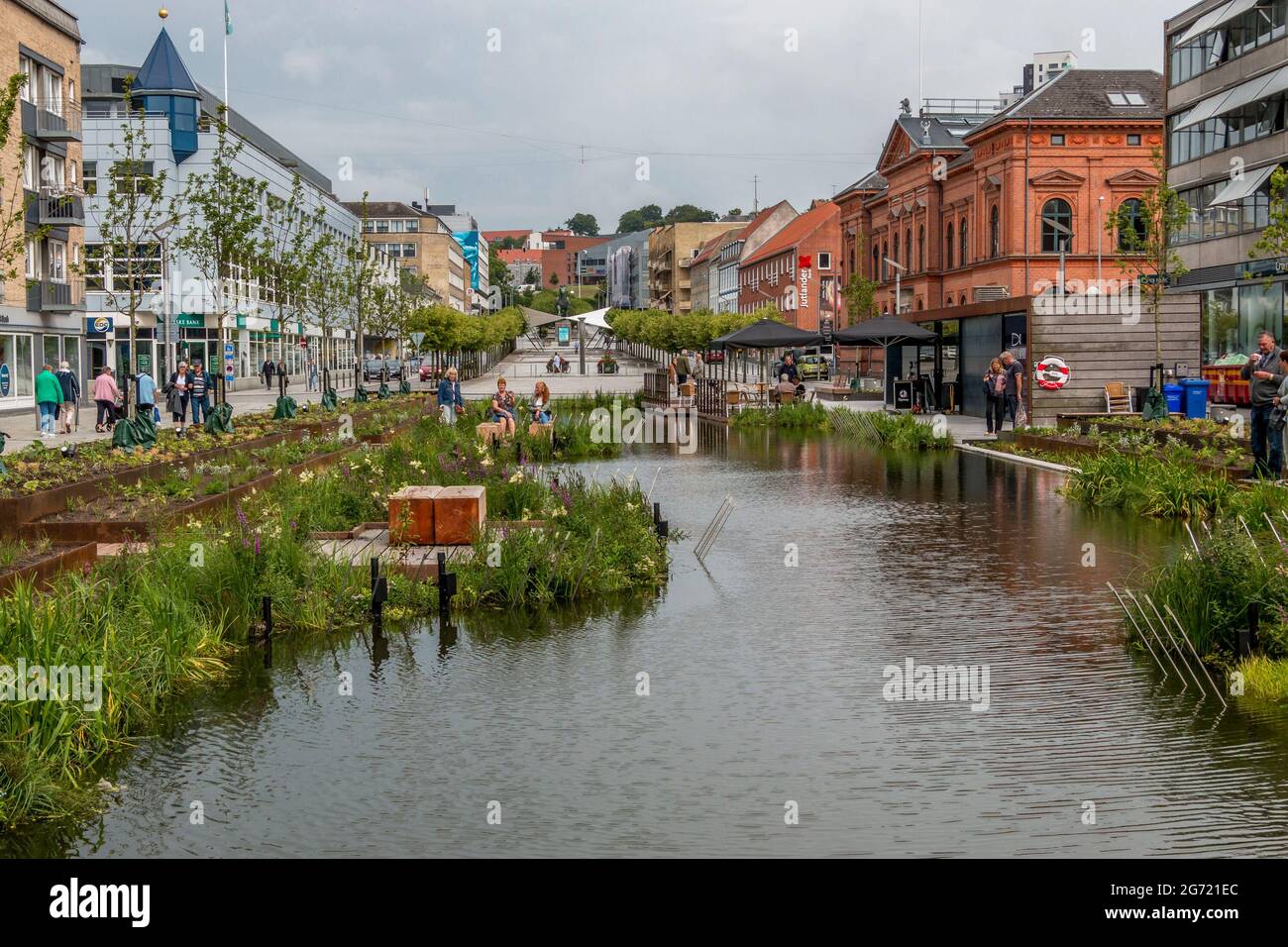 Randers, Denmark - 10-July-2021: The new rainwater basin at Ostervold in  Randers, People look at flowers and nature, street resturant Stock Photo -  Alamy