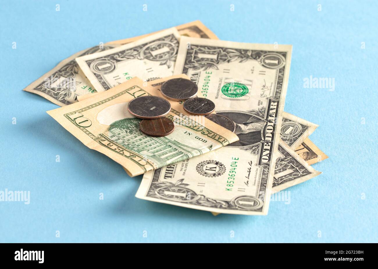 A Pile of American Money on a Bright Background Stock Photo