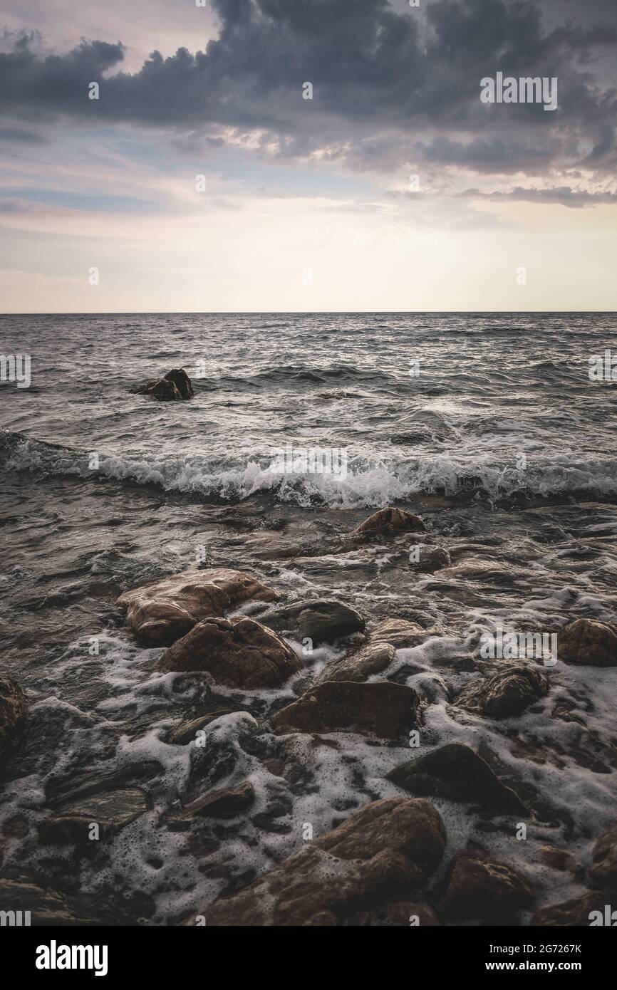 Vertical shot of a rocky shore for wallpaper and background Stock Photo ...