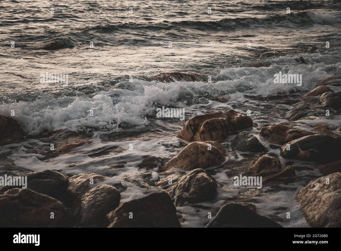 Closeup shot of a rocky shore for wallpaper and background Stock Photo ...