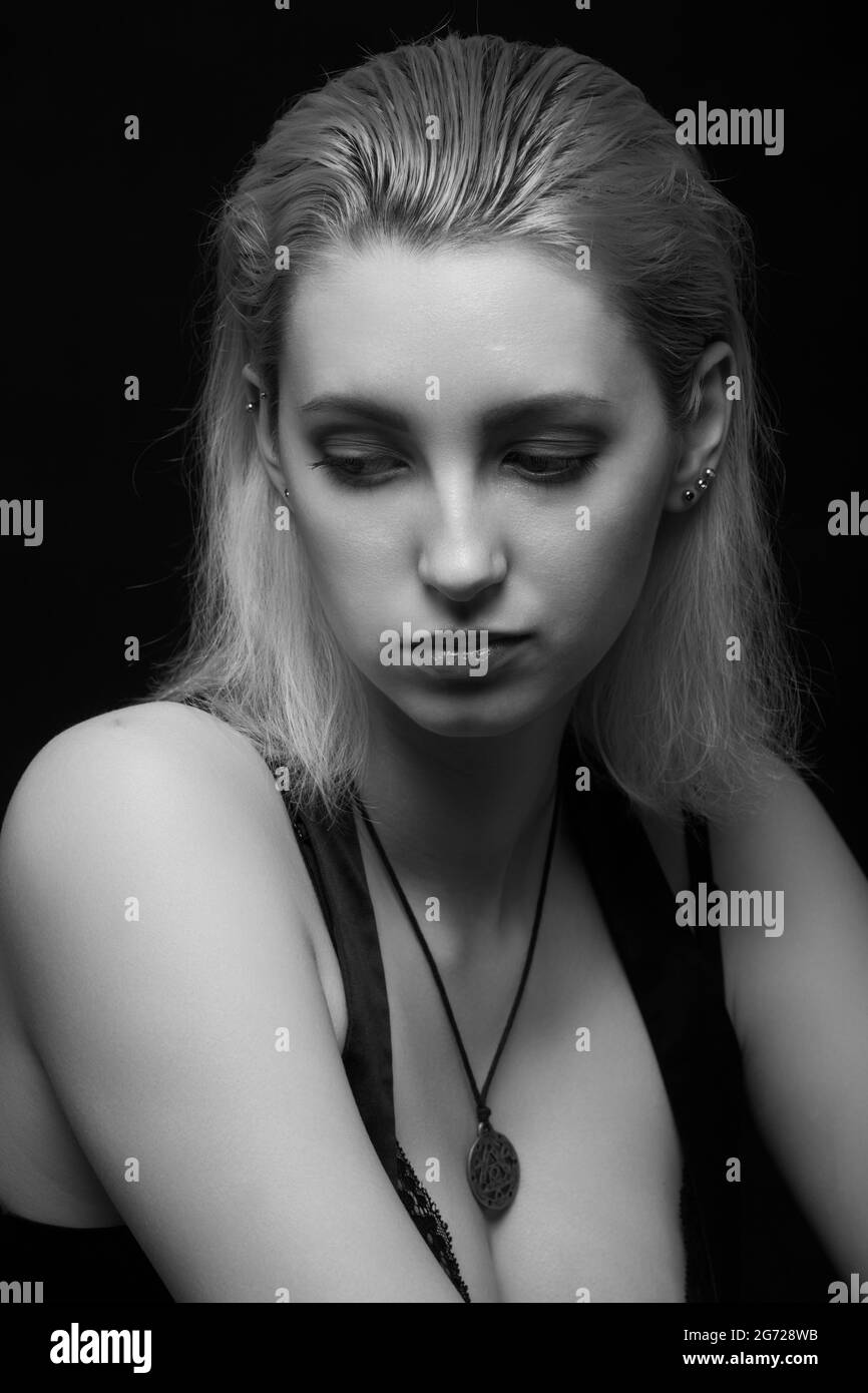 Pensive sorrowful hi-res stock photography and images - Alamy