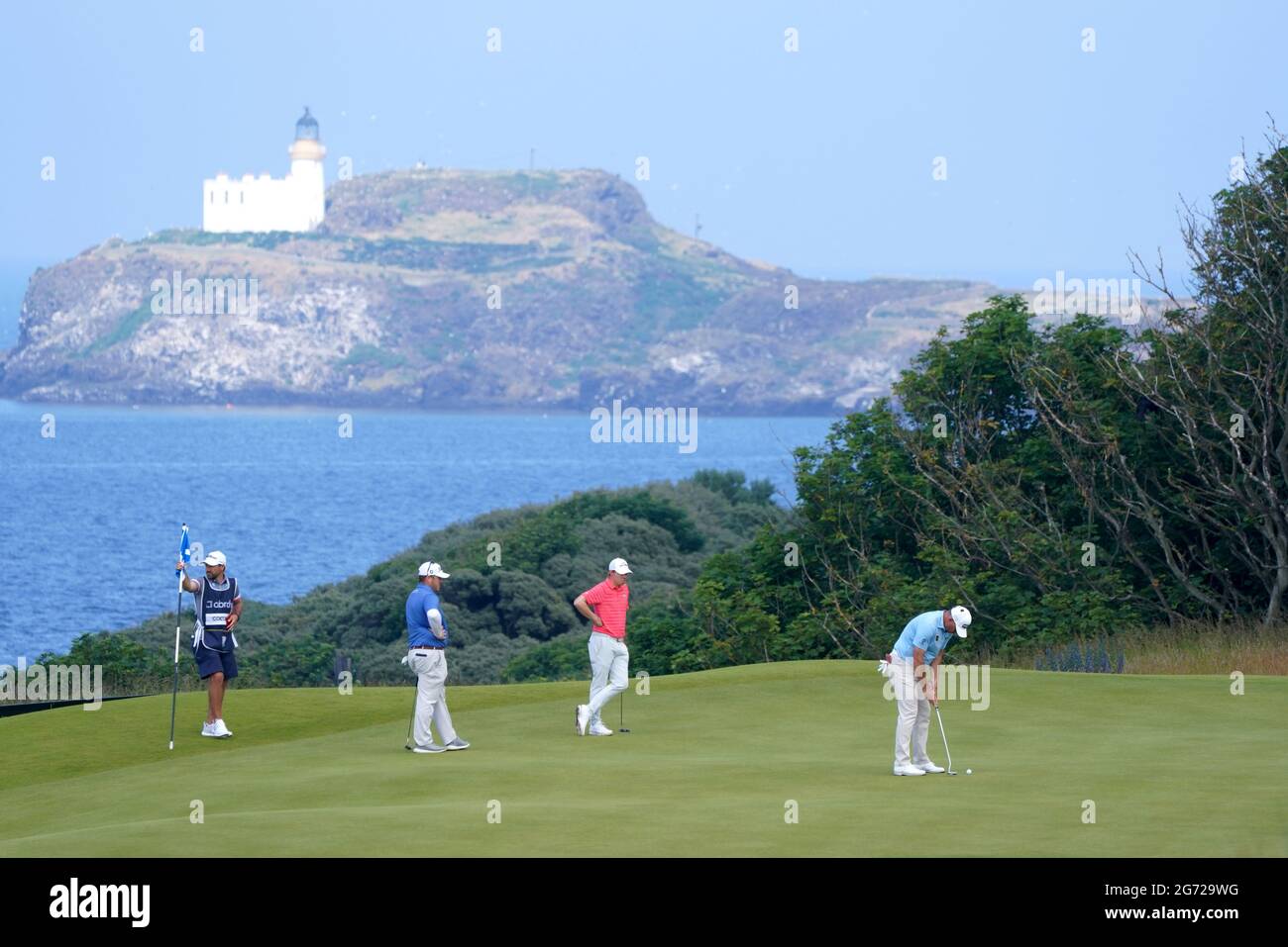 Lee Westwood putts on the 13th green during day three of the Aberdeen ...