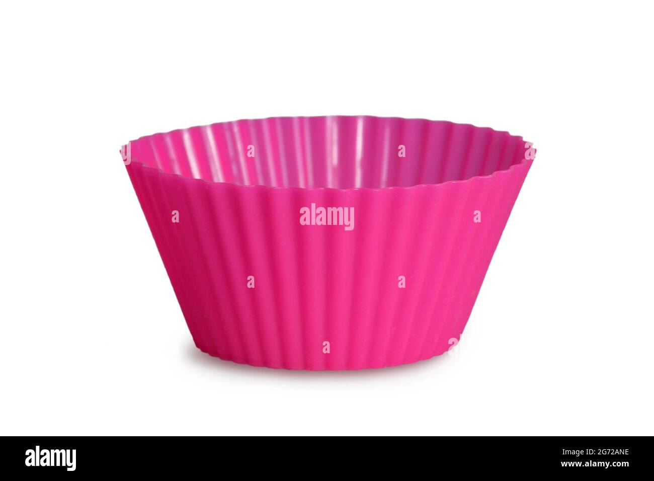 Silicone muffin baking cup isolated on white background. Reusable cupcake liner Stock Photo