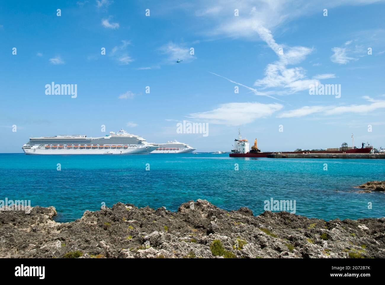 The helicopter flying over ships in Town port on Grand Cayman