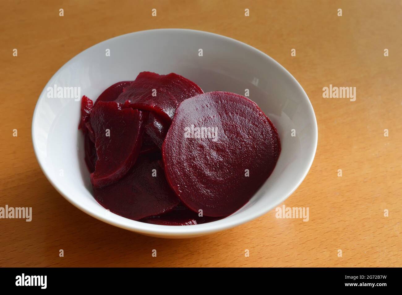 Pickled red beet salad in bowl Stock Photo