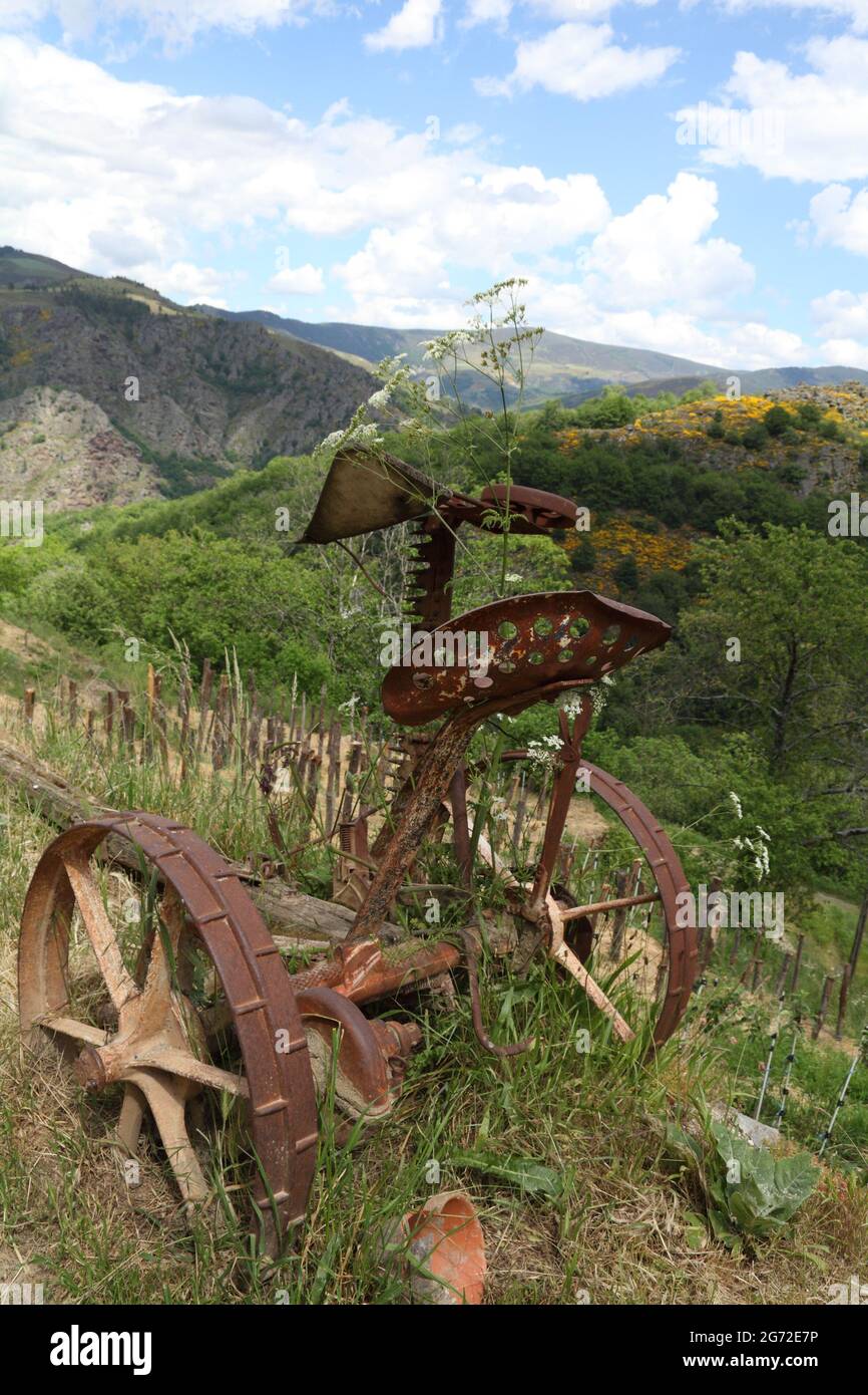 Ancient plough on remote hill farm in the Cevennes, Lozere, Occitania, France Stock Photo