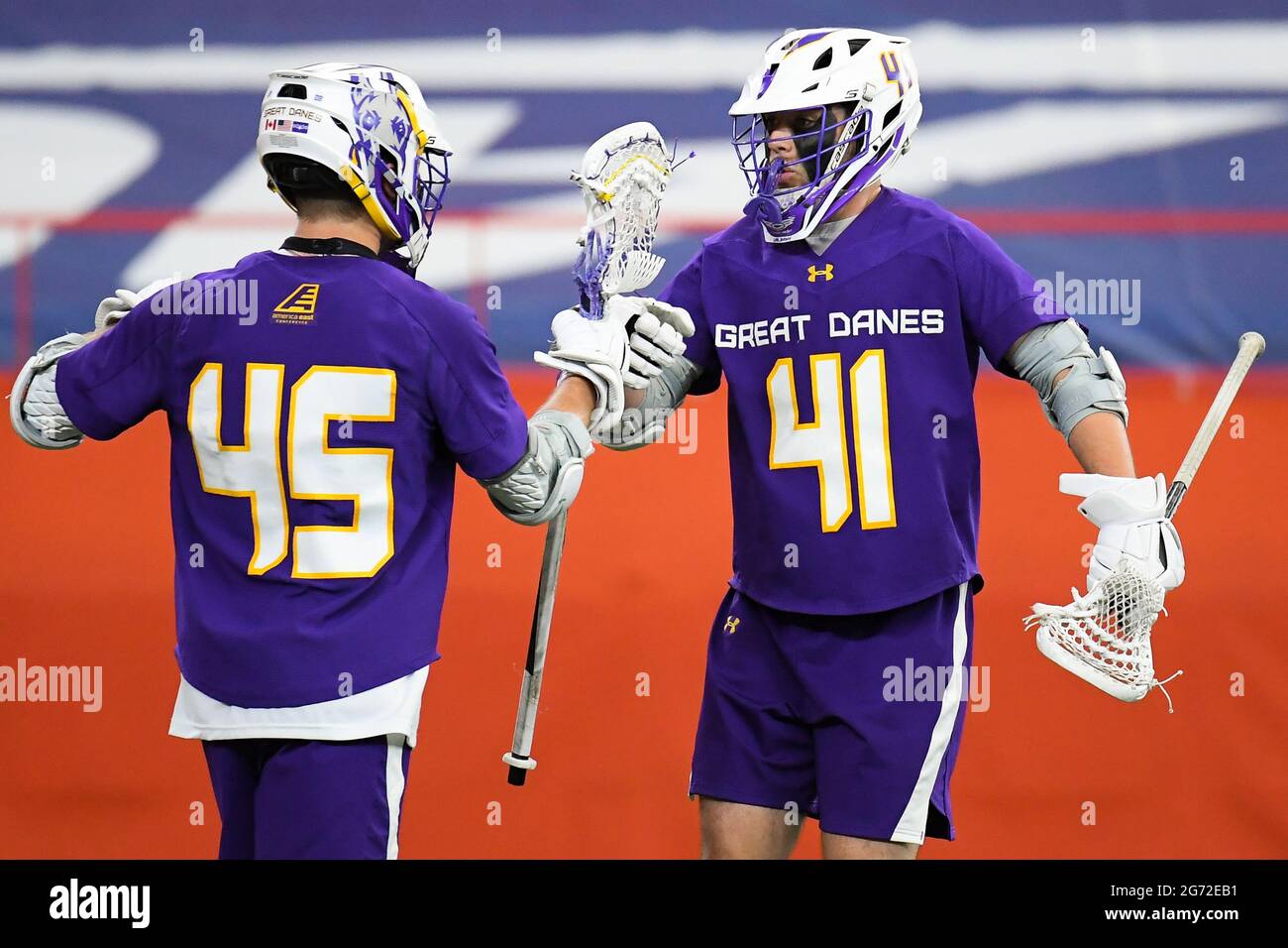 Syracuse, New York, USA. 08th Apr, 2021. Albany Great Danes midfielders Graydon Hogg (45) and Steve Ramirez (41) celebrate a goal against the Syracuse Orange during the first half of an NCAA mens lacrosse game on Thursday, April 8, 2021 at the Carrier Dome in Syracuse, New York. Syracuse won 13-8. Rich Barnes/CSM/Alamy Live News Stock Photo